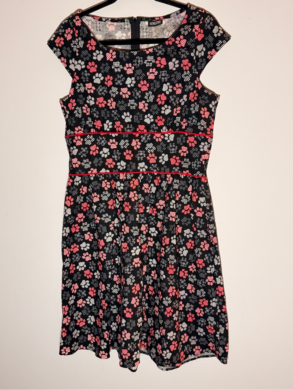 Women’s Black Fit & Flare Dress with Paw Print Accents - Picture 1 of 6